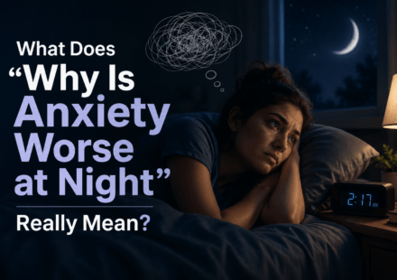 Woman lying awake in bed at night with anxious thoughts, moonlight through the window, and the text “Why Is Anxiety Worse at Night” displayed prominently.