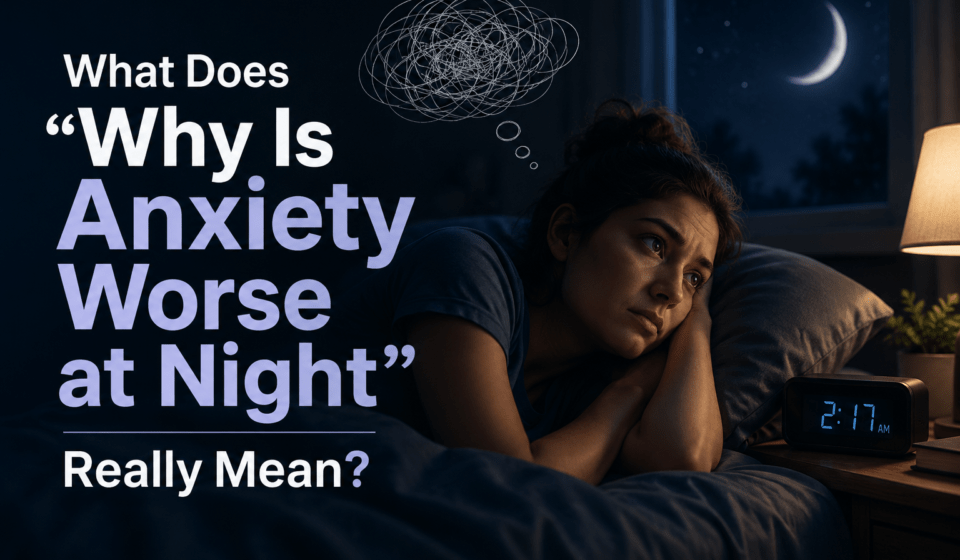 Woman lying awake in bed at night with anxious thoughts, moonlight through the window, and the text “Why Is Anxiety Worse at Night” displayed prominently.